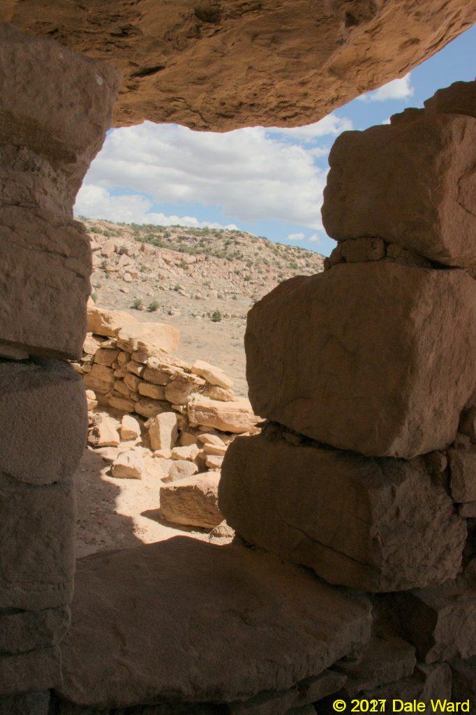 Looking through the doorway of a cliff ruinLooking through the doorway of a cliff ruin